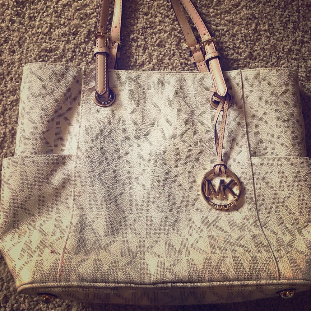 Cream colored Michael Kors purse